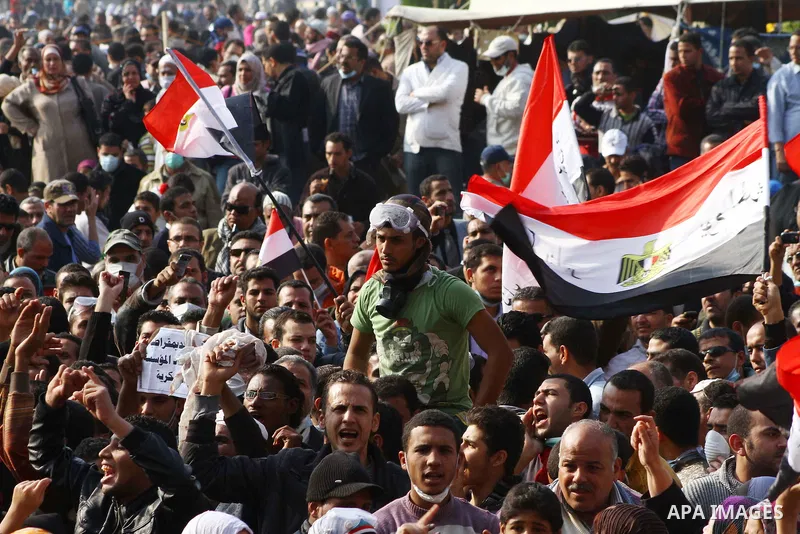 Thousands of Egyptian protesters attend a rally in Tahrir Square on the fourth day of clashes between protesters and riot police in the capital Cairo, on November 22, 2011, as they demand an end to military rule, heighte...