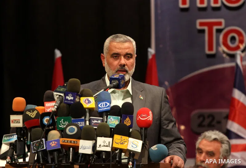 Palestinian prime minister in Gaza Strip, Ismail Haniya attends a celebration with members of the spring of freedom convoy in Gaza city on Nov. 22,2011. . Photo by Mohammed Asad