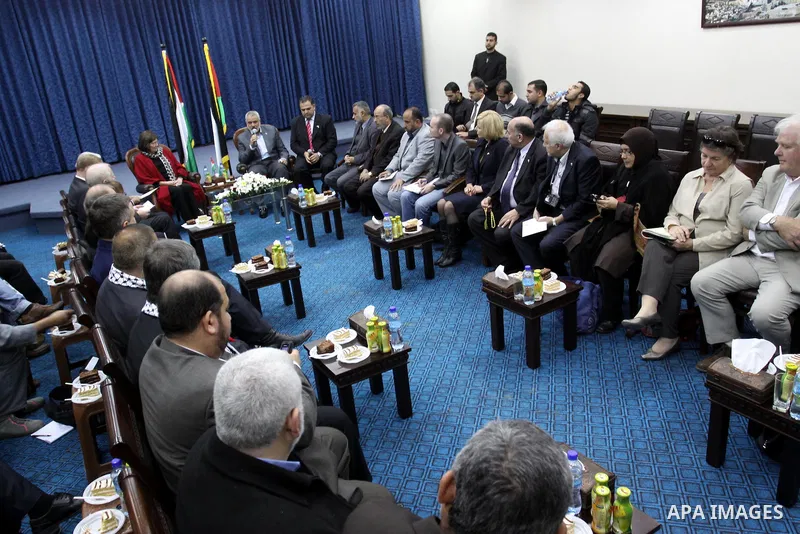 Palestinian Prime Minister in Gaza Strip, Ismail Haniyeh meets with the members of the spring of freedom convoy at his office in Gaza city on Nov. 23, 2011. A convoy carrying Arab, European and International activists vi...