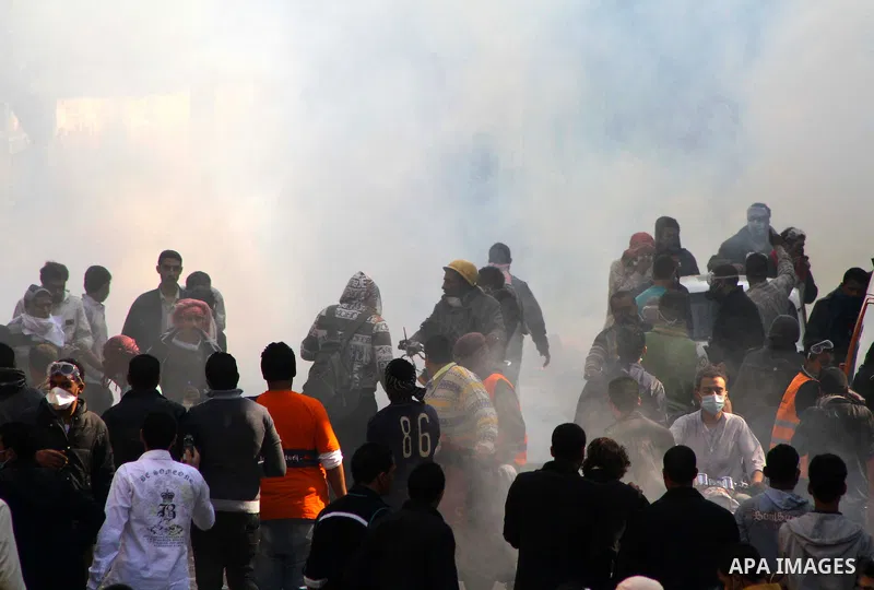 Egyptian protestors clash with riot police, not pictured, near Tahrir square in Cairo, Egypt, Wednesday, Nov. 23, 2011. Egyptian police are clashing with anti-government protesters for a fifth day in Cairo. Tens of thous...