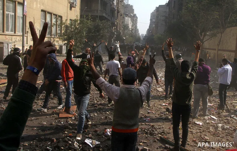 Egyptian riot police clash with protestors near Tahrir square in Cairo, Egypt, Wednesday, Nov. 23, 2011. Egyptian police are clashing with anti-government protesters for a fifth day in Cairo. Tens of thousands of protest...
