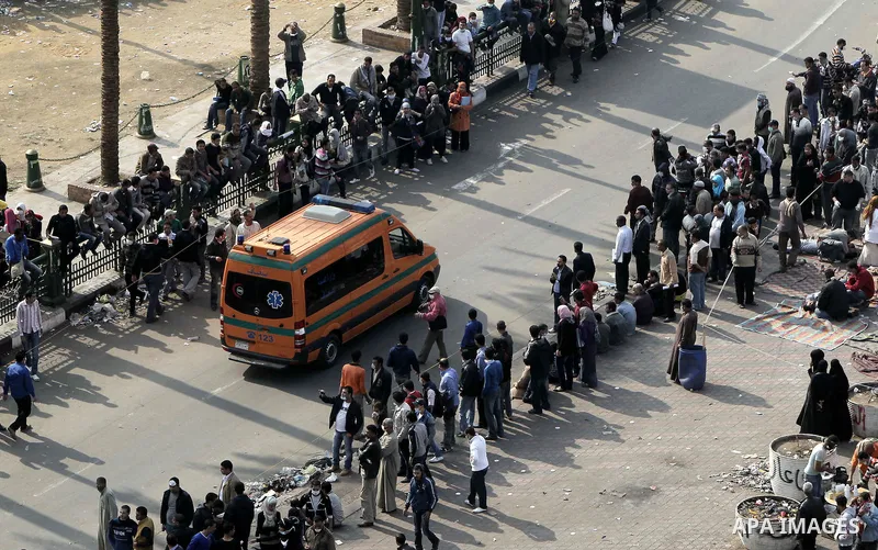 Protesters gather on Tahrir square as clashes against the anti-riot police are underway nearby in the street leading to the ministry of interior in Cairo, Egypt, Wednesday, Nov. 23, 2011. Tens of thousands of protesters...
