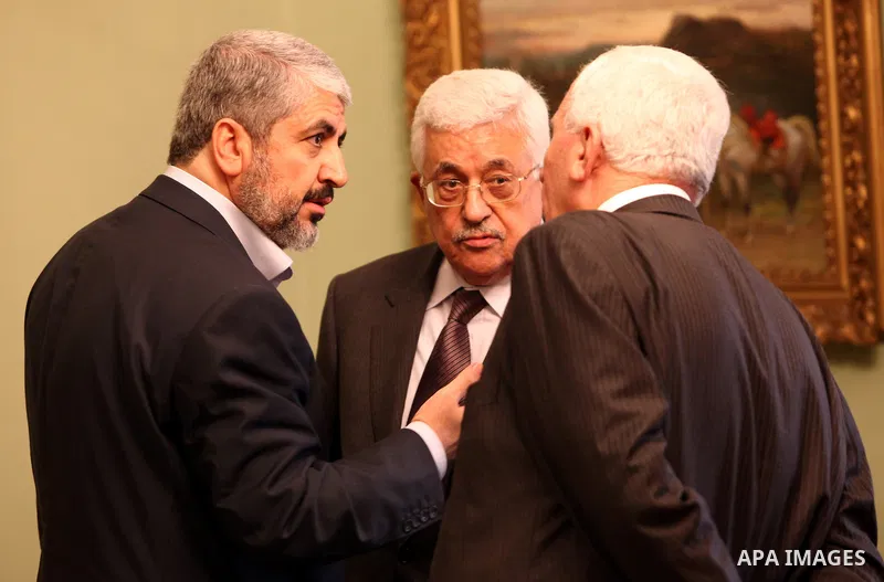 Palestinian president Mahmud Abbas meets with Hamas chief Khaled Meshaal and other top Fatah and Hamas officials in Cairo on November 24, 2011. Abbas and Meshaal hailed a new Palestinian "partnership" after talks to impl...