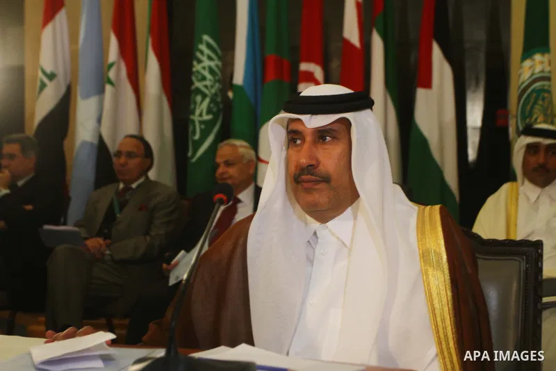 Qatar's Prime Minister and Foreign Minister Sheikh Hamad bin Jassim al-Thani attends a ministerial meeting at the Arab League headquarters on Syria in Cairo on November 24, 2011. Arab foreign ministers have invited Syria...