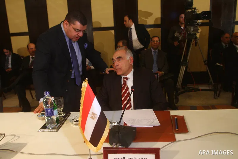 Egyptian Foreign Minister Mohammed Amro attends a ministerial meeting at the Arab League headquarters on Syria in Cairo on November 24, 2011. Arab foreign ministers have invited Syria to sign an agreement by November 25...