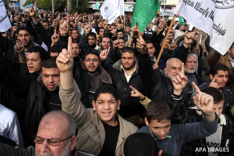 Palestinian Hamas supporters take part in a rally in Gaza City to show their solidarity for Al-Aqsa mosque in Jerusalem November 25, 2011. The mosque built on the compound known to Muslims as al-Haram al-Sharif and to Je...