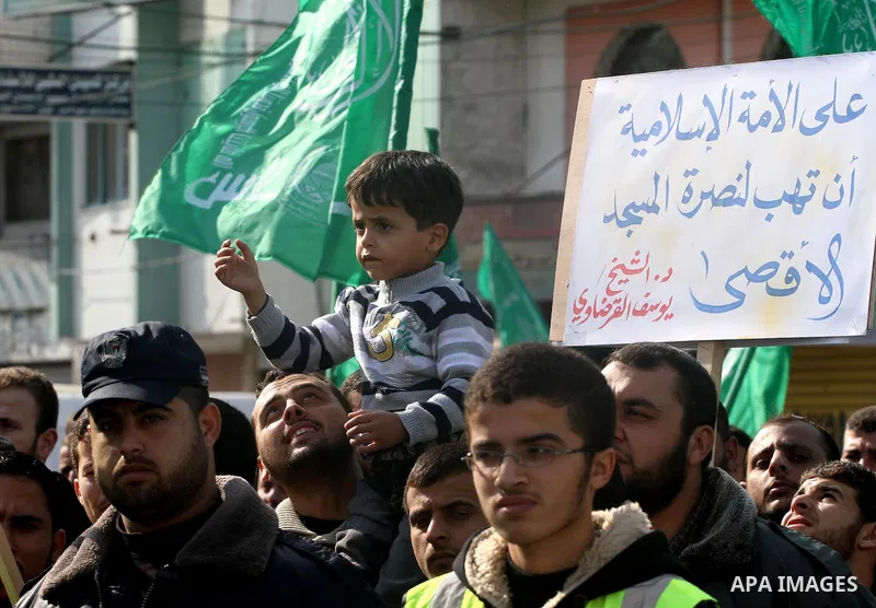 Palestinian Hamas supporters take part in a rally in Gaza City to show their solidarity for Al-Aqsa mosque in Jerusalem November 25, 2011. The mosque built on the compound known to Muslims as al-Haram al-Sharif and to Je...