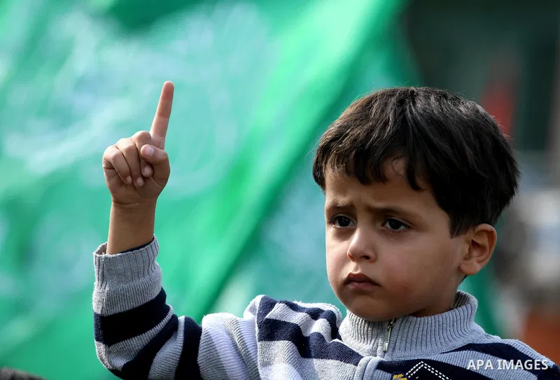 Palestinian Hamas supporters take part in a rally in Gaza City to show their solidarity for Al-Aqsa mosque in Jerusalem November 25, 2011. The mosque built on the compound known to Muslims as al-Haram al-Sharif and to Je...