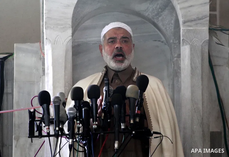 Palestinian prime minister in Gaza Strip, Ismail Haniya speaks during Friday prayers to supporters gathering for a rally in Gaza City to show their solidarity for Al-Aqsa mosque in Jerusalem November 25, 2011. The mosque...