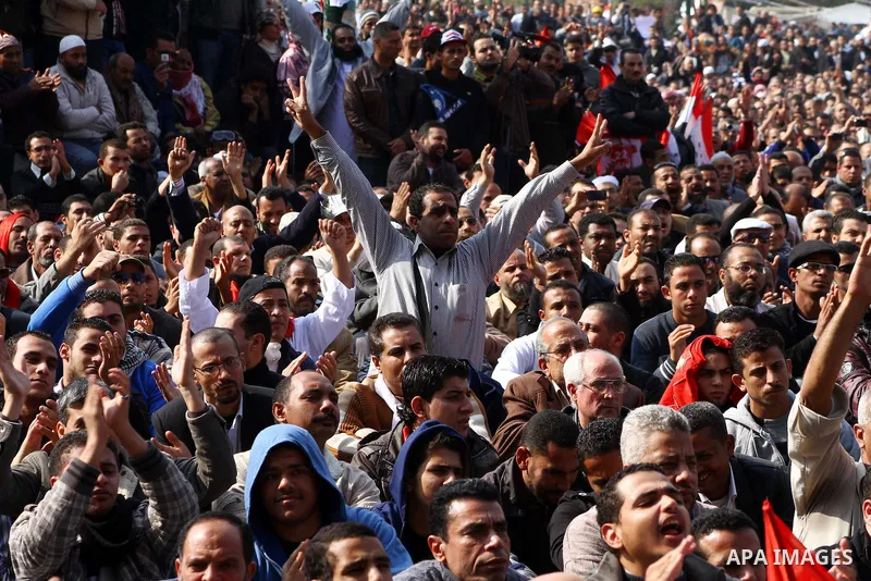 Egyptian demonstrators take part in a mass rally in Cairo's landmark Tahrir square on November 25, 2011 to demand an end to the military rule. The head of the military council tasked 79-year-old Kamal al-Ganzuri, who was...