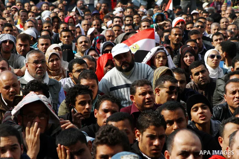 Egyptian demonstrators take part in a mass rally in Cairo's landmark Tahrir square on November 25, 2011 to demand an end to the military rule. The head of the military council tasked 79-year-old Kamal al-Ganzuri, who was...
