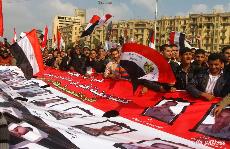 Egyptian demonstrators take part in a mass rally in Cairo's landmark Tahrir square on November 25, 2011 to demand an end to the military rule. The head of the military council tasked 79-year-old Kamal al-Ganzuri, who was...