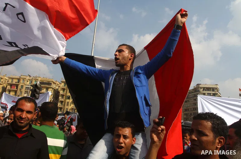 Egyptian demonstrators take part in a mass rally in Cairo's landmark Tahrir square on November 25, 2011 to demand an end to the military rule. The head of the military council tasked 79-year-old Kamal al-Ganzuri, who was...
