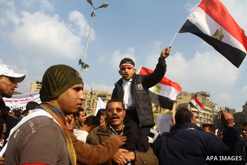 Egyptian demonstrators take part in a mass rally in Cairo's landmark Tahrir square on November 25, 2011 to demand an end to the military rule. The head of the military council tasked 79-year-old Kamal al-Ganzuri, who was...