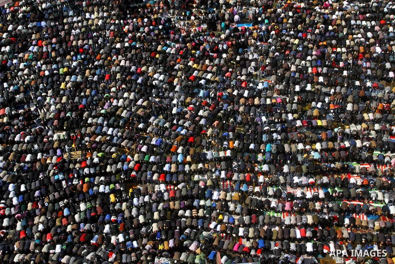 Egyptian protesters pray during a mass rally in Cairo's landmark Tahrir square on November 25, 2011 to demand an end to the military rule. The head of the military council tasked 79-year-old Kamal al-Ganzuri, who was pre...