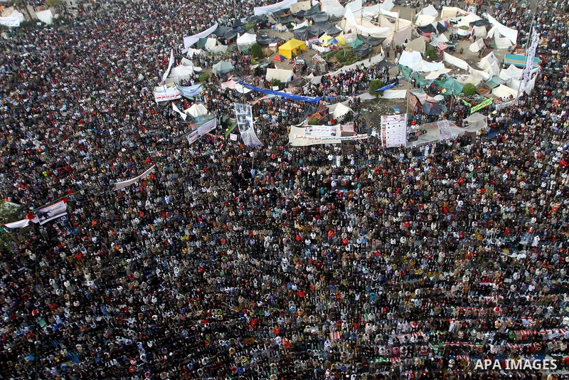 Egyptian protesters pray during a mass rally in Cairo's landmark Tahrir square on November 25, 2011 to demand an end to the military rule. The head of the military council tasked 79-year-old Kamal al-Ganzuri, who was pre...