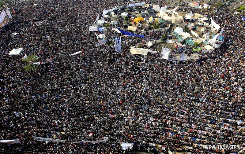 Egyptian protesters pray during a mass rally in Cairo's landmark Tahrir square on November 25, 2011 to demand an end to the military rule. The head of the military council tasked 79-year-old Kamal al-Ganzuri, who was pre...