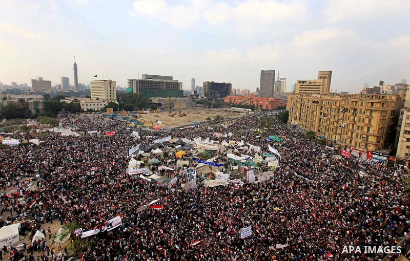 Egyptian demonstrators take part in a mass rally in Cairo's landmark Tahrir square on November 25, 2011 to demand an end to the military rule. The head of the military council tasked 79-year-old Kamal al-Ganzuri, who was...