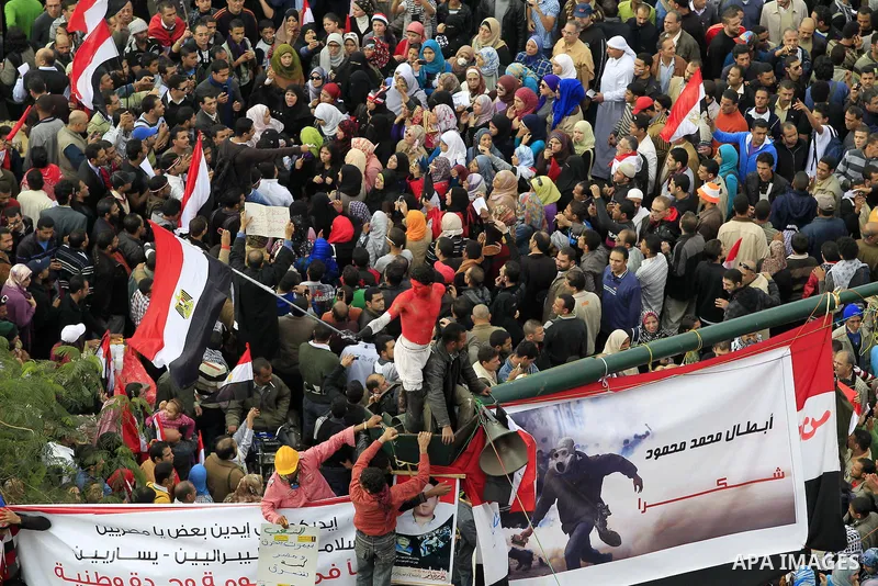 Egyptian demonstrators take part in a mass rally in Cairo's landmark Tahrir square on November 25, 2011 to demand an end to the military rule. The head of the military council tasked 79-year-old Kamal al-Ganzuri, who was...