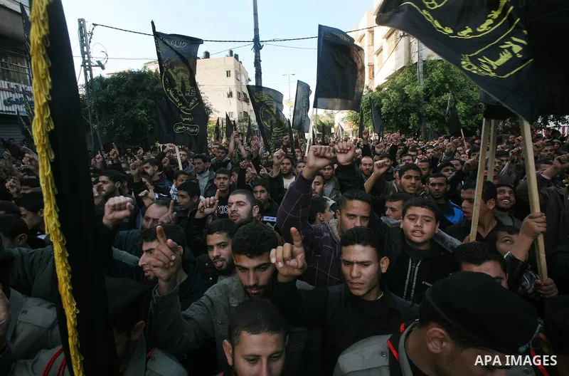 Palestinian Jihad Islamic supporters take part in a rally in Gaza City to show their solidarity for Al-Aqsa mosque in Jerusalem November 25, 2011. The mosque built on the compound known to Muslims as al-Haram al-Sharif a...