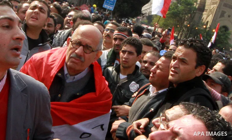 Pro-reform leader and Nobel peace laureate Mohamed El-Baradei is surrounded by protesters during his arrival for Friday prayers in Tahrir Square in Cairo, Egypt, 25 November 2011. The head of the military council tasked...