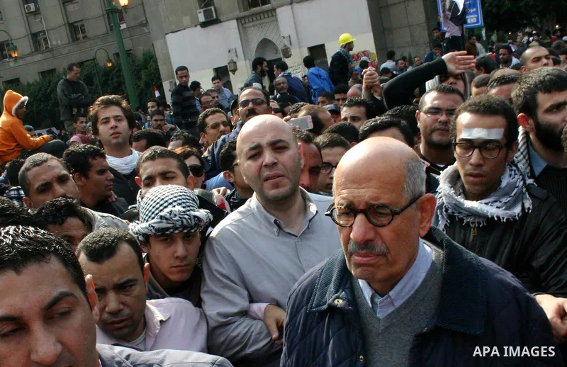 Pro-reform leader and Nobel peace laureate Mohamed El-Baradei is surrounded by protesters during his arrival for Friday prayers in Tahrir Square in Cairo, Egypt, 25 November 2011. The head of the military council tasked...