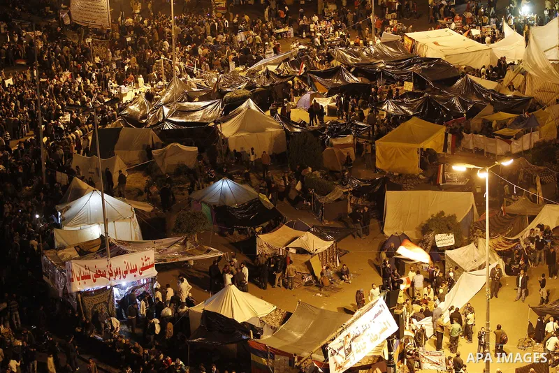 Thousands of Egyptian protesters attend a mass protest in Cairo's Tahrir square on November 24, 2011, as members of Egypt's ruling military council rejected calls to step down immediately, saying it would amount to a "be...