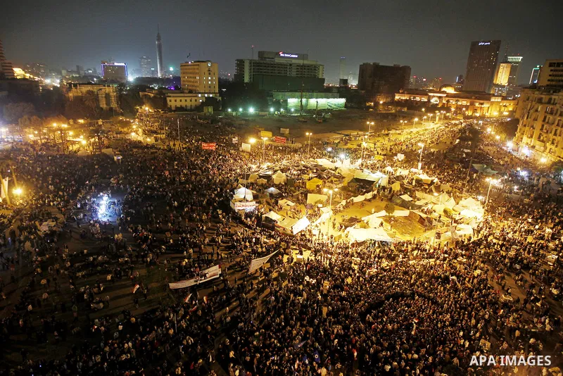 Thousands of Egyptian protesters attend a mass protest in Cairo's Tahrir square on November 24, 2011, as members of Egypt's ruling military council rejected calls to step down immediately, saying it would amount to a "be...