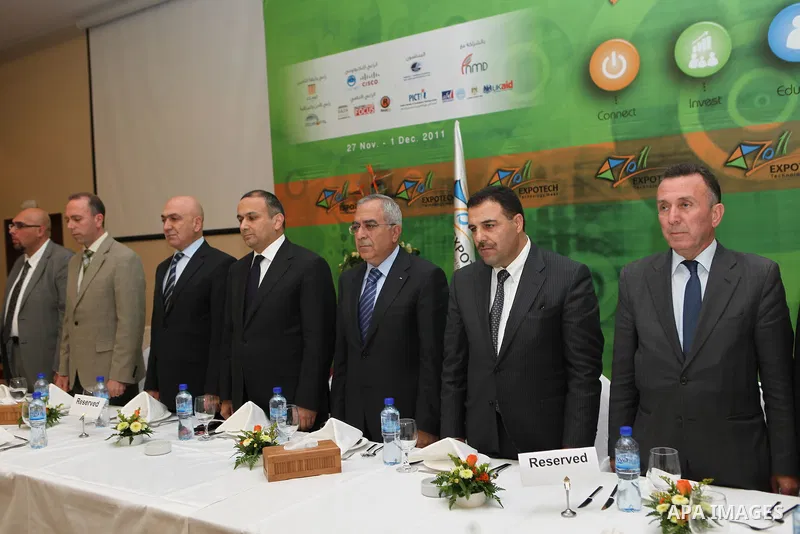 Palestinian Prime Minister Salam Fayyad participate in the opening of the Expotech gallery of information technology in the West Bank of Ramallah, on Nov. 27, 2011. Photo by Mustafa Abu Dayeh