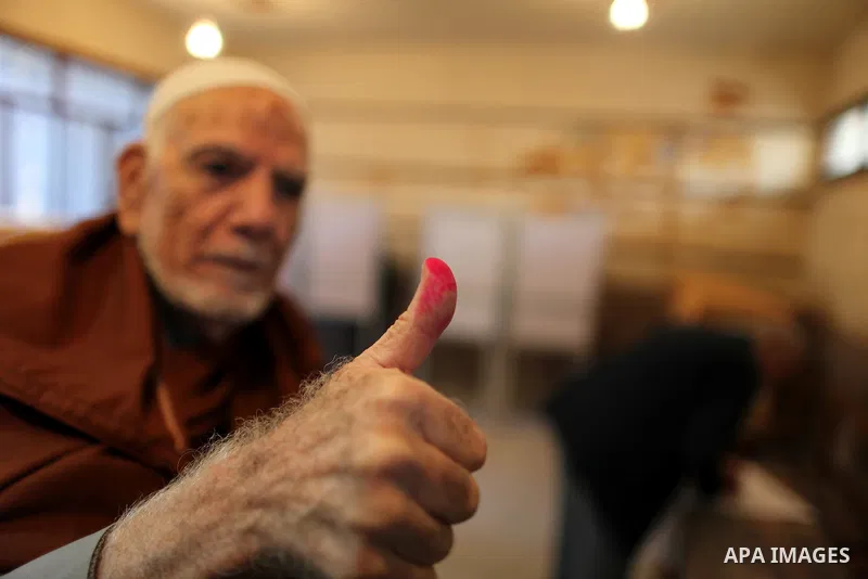 An elderly Egyptian man casts his vote at a polling station in the Manial neighbourhood of Cairo on November 28, 2011. Egyptians began voting in the first elections since the fall of autocrat Hosni Mubarak who was ousted...