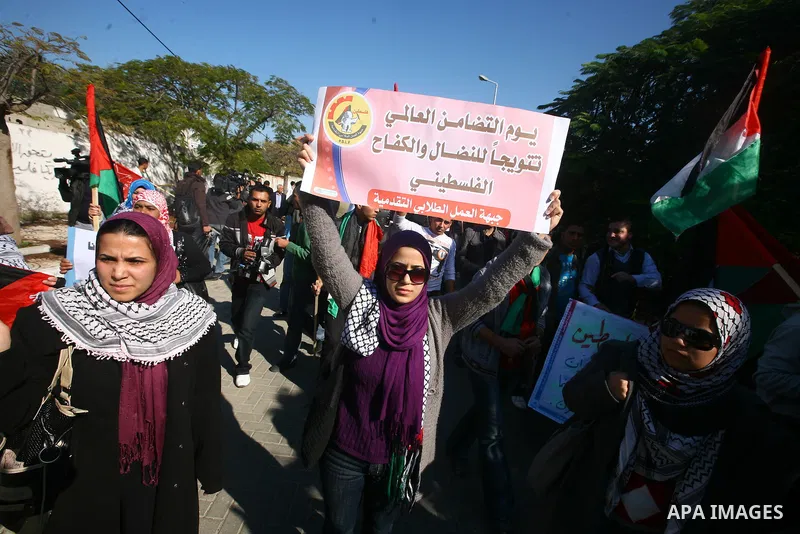Palestinians take part in a rally in Gaza City marking the U.N.'s International Day of Solidarity with the Palestinian People November 29, 2011. Photo by Majdi Fathi
