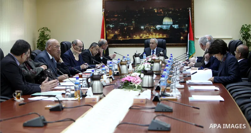 Palestinian Prime Minister Salam Fayyad heads the cabinet in the West Bank city of Ramallah on Nov. 29, 2011. Photo by Mustafa Abu Dayeh