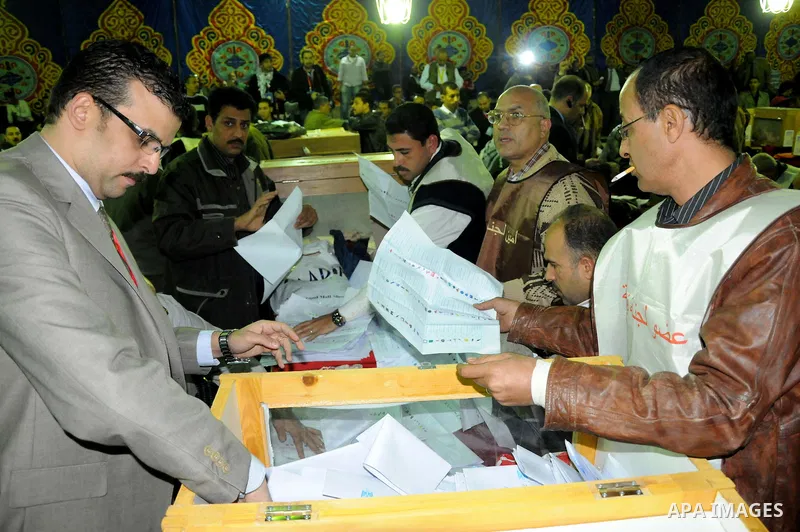 Election workers count ballots for the parliamentary elections in Luxor, Egypt, Tuesday, Nov. 29, 2011. Egypt's military rulers are taking credit for the strong turnout in the country's first parliamentary elections sinc...