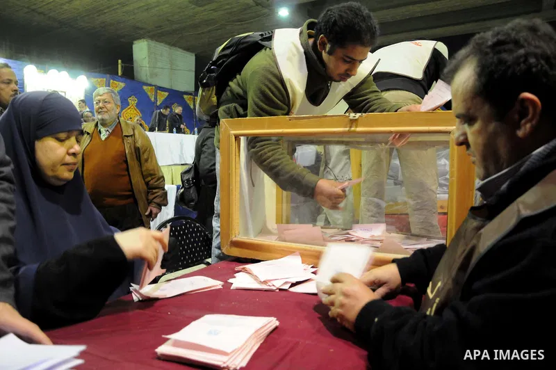 Election workers count ballots for the parliamentary elections in Luxor, Egypt, Tuesday, Nov. 29, 2011. Egypt's military rulers are taking credit for the strong turnout in the country's first parliamentary elections sinc...