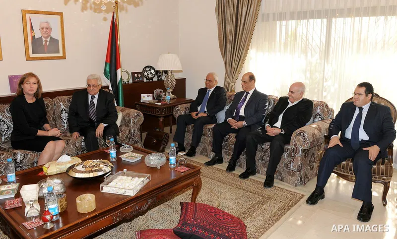 Palestine President, Mahmoud Abbas (Abu Mazen) speaks during a meeting with Israeli opposition leader Tzipi Livni, today in Amman on Nov. 30, 2011. Photo by Thaer Ganaim