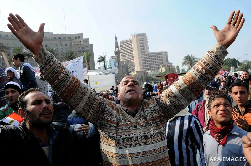 Egyptian protesters attend a demonstration in Tahrir Square, in Cairo, Egypt, Friday, Dec. 2, 2011. Islamists appear to have taken a strong majority of seats in the first round of Egypt's first parliamentary vote since H...