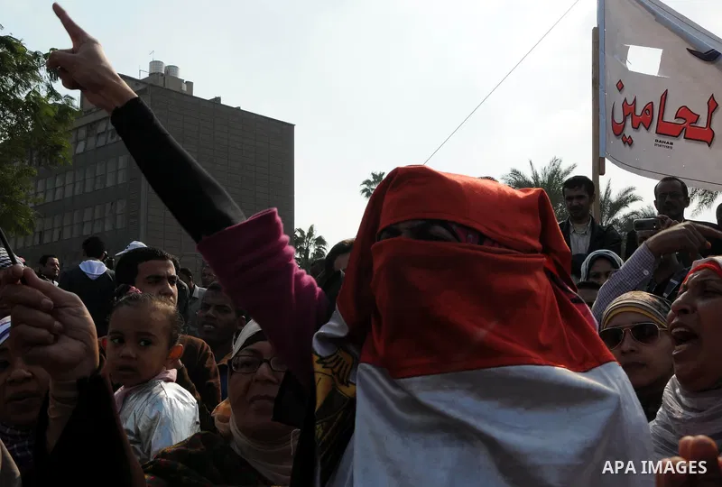 Egyptian protesters attend a demonstration in Tahrir Square, in Cairo, Egypt, Friday, Dec. 2, 2011. Islamists appear to have taken a strong majority of seats in the first round of Egypt's first parliamentary vote since H...