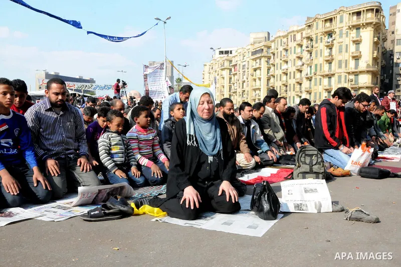 Egyptian protesters attend Friday prayers during a demonstration in Tahrir Square, in Cairo, Egypt, Friday, Dec. 2, 2011. Islamists appear to have taken a strong majority of seats in the first round of Egypt's first parl...