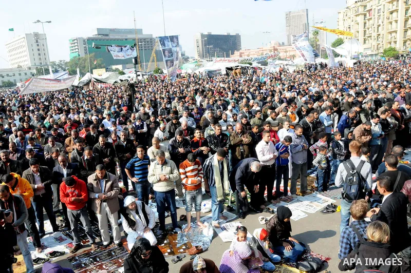 Egyptian protesters attend Friday prayers during a demonstration in Tahrir Square, in Cairo, Egypt, Friday, Dec. 2, 2011. Islamists appear to have taken a strong majority of seats in the first round of Egypt's first parl...