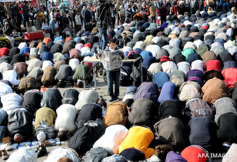 Egyptian protesters attend Friday prayers during a demonstration in Tahrir Square, in Cairo, Egypt, Friday, Dec. 2, 2011. Islamists appear to have taken a strong majority of seats in the first round of Egypt's first parl...