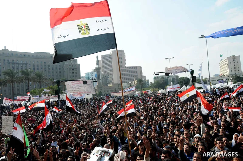 Egyptian protesters attend a demonstration in Tahrir Square, in Cairo, Egypt, Friday, Dec. 2, 2011. Islamists appear to have taken a strong majority of seats in the first round of Egypt's first parliamentary vote since H...
