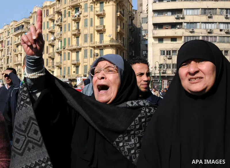 Egyptian protesters attend a demonstration in Tahrir Square, in Cairo, Egypt, Friday, Dec. 2, 2011. Islamists appear to have taken a strong majority of seats in the first round of Egypt's first parliamentary vote since H...