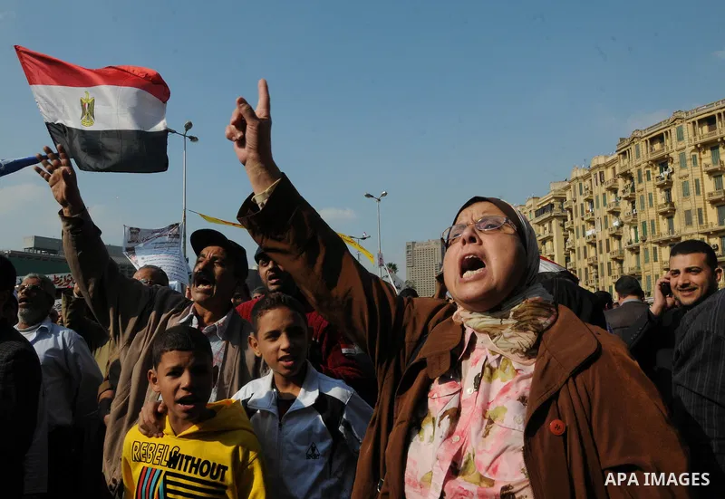 Egyptian protesters attend a demonstration in Tahrir Square, in Cairo, Egypt, Friday, Dec. 2, 2011. Islamists appear to have taken a strong majority of seats in the first round of Egypt's first parliamentary vote since H...