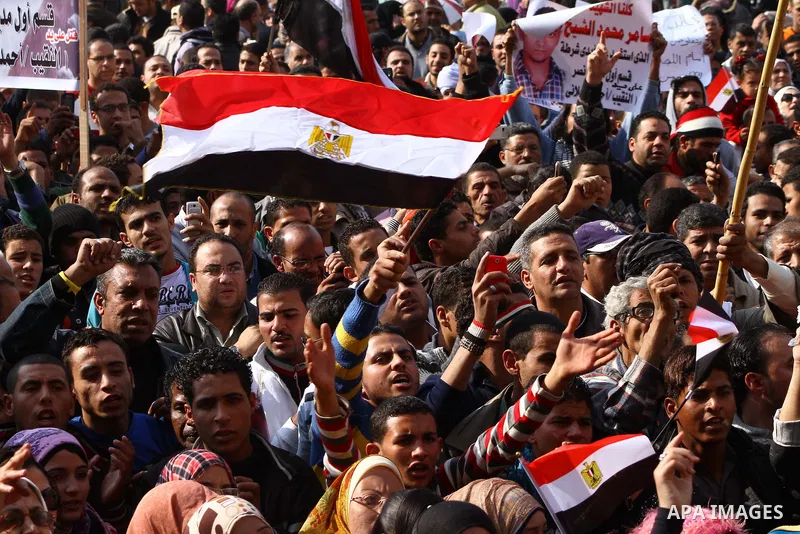 Egyptian protesters attend a demonstration in Tahrir Square, in Cairo, Egypt, Friday, Dec. 2, 2011. Islamists appear to have taken a strong majority of seats in the first round of Egypt's first parliamentary vote since H...