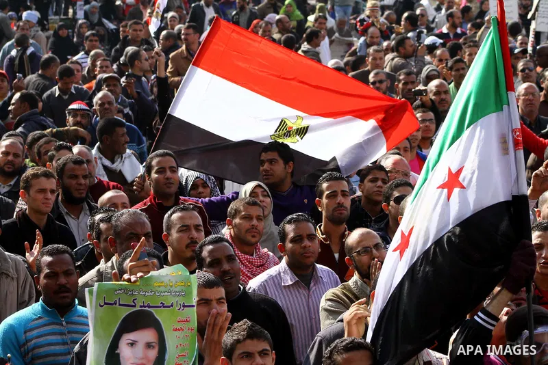 Egyptian protesters attend a demonstration in Tahrir Square, in Cairo, Egypt, Friday, Dec. 2, 2011. Islamists appear to have taken a strong majority of seats in the first round of Egypt's first parliamentary vote since H...
