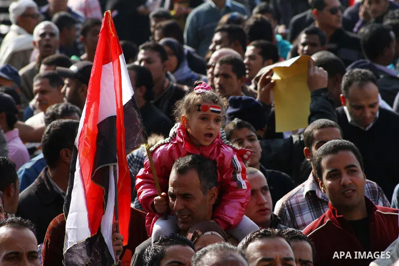 Egyptian protesters attend a demonstration in Tahrir Square, in Cairo, Egypt, Friday, Dec. 2, 2011. Islamists appear to have taken a strong majority of seats in the first round of Egypt's first parliamentary vote since H...