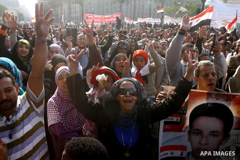 Egyptian protesters attend a demonstration in Tahrir Square, in Cairo, Egypt, Friday, Dec. 2, 2011. Islamists appear to have taken a strong majority of seats in the first round of Egypt's first parliamentary vote since H...