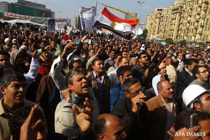 Egyptian protesters attend a demonstration in Tahrir Square, in Cairo, Egypt, Friday, Dec. 2, 2011. Islamists appear to have taken a strong majority of seats in the first round of Egypt's first parliamentary vote since H...
