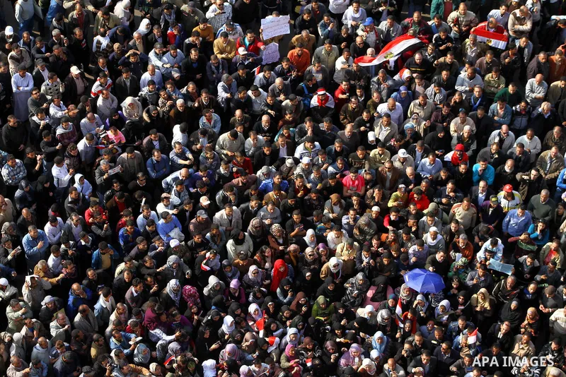 Egyptian protesters attend a demonstration in Tahrir Square, in Cairo, Egypt, Friday, Dec. 2, 2011. Islamists appear to have taken a strong majority of seats in the first round of Egypt's first parliamentary vote since H...
