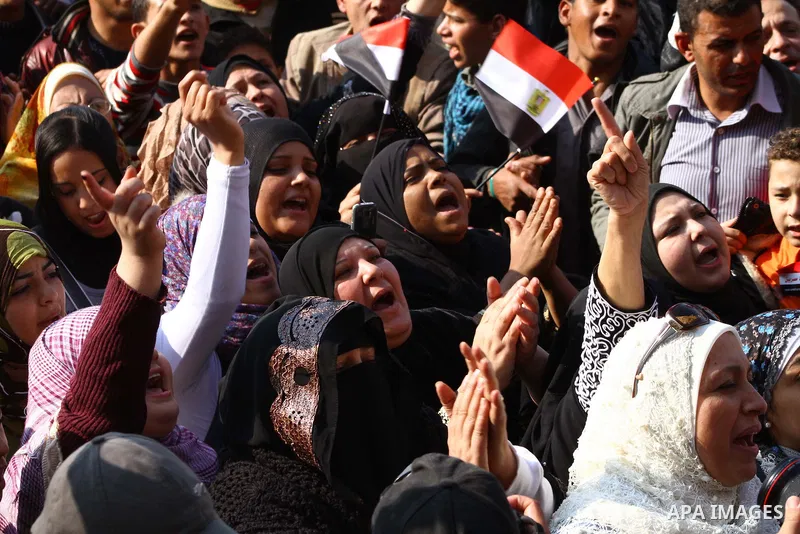 Egyptian protesters attend a demonstration in Tahrir Square, in Cairo, Egypt, Friday, Dec. 2, 2011. Islamists appear to have taken a strong majority of seats in the first round of Egypt's first parliamentary vote since H...